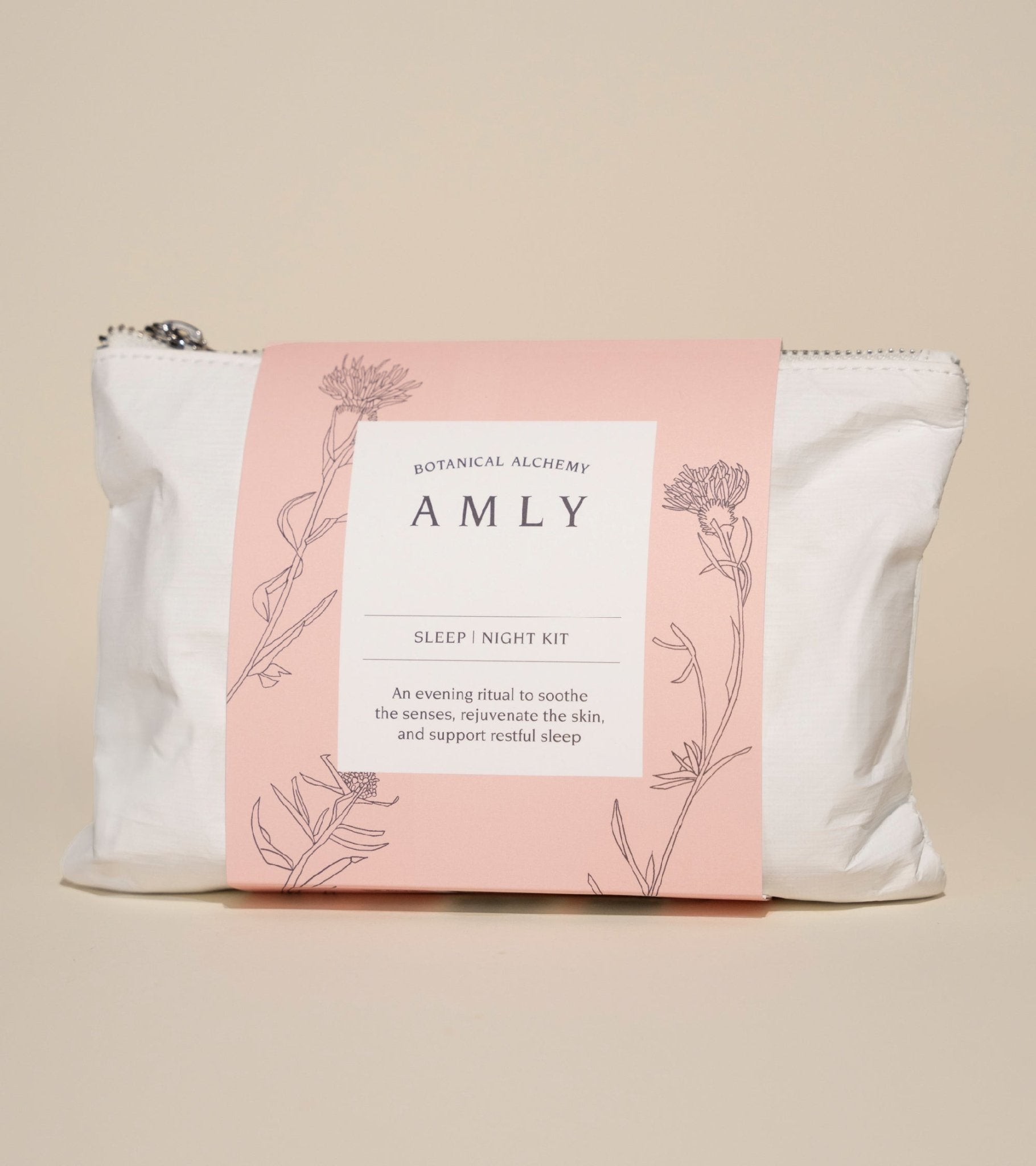 AMLY Sleep Night Kit in a recycled pink and cream washbag